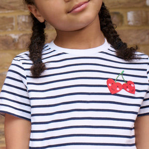 two smiling cherries - iron on patch on Breton stripe t-shirt